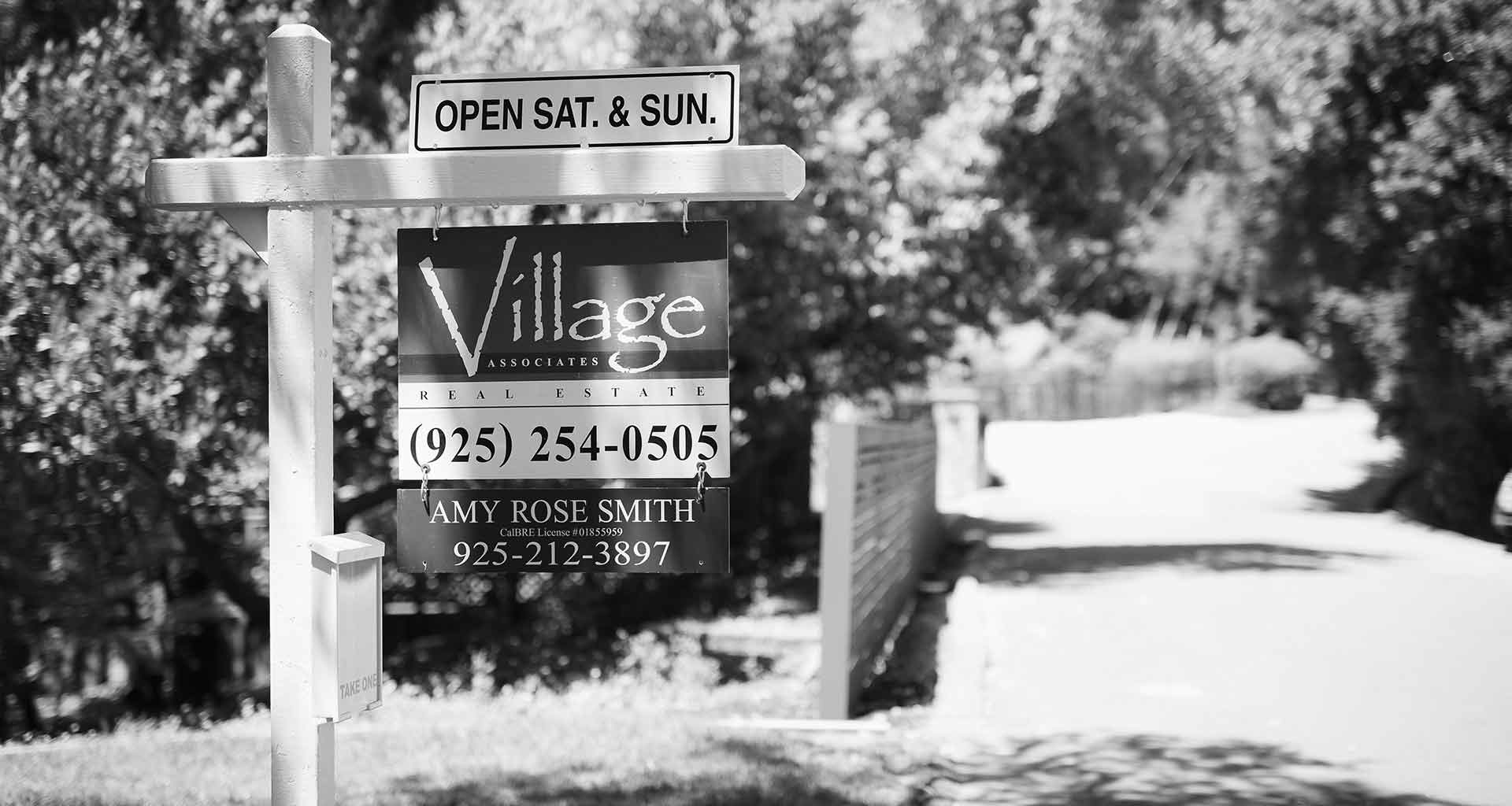 Village Associates open house sign with Amy Rose Smith's name